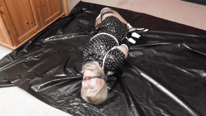 www.naughtynina.net - Hogtied In Plastic Dress and Panties  thumbnail